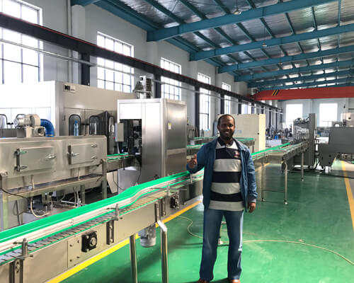 Kenya Mr ali purchased king machine filling line (3).JPG Kenya Mr ali purchased king machine filling line (3).JPG