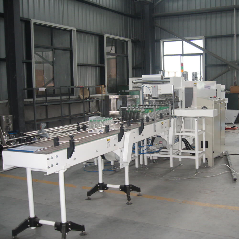 Automatic Linear Type Film Shrink Wrapping Machine With Half Tray
