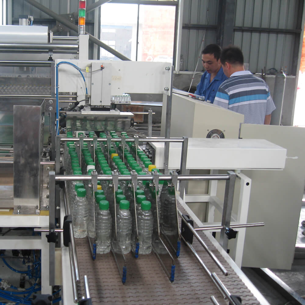Automatic Linear Type Film Shrink Wrapping Machine With Half Tray